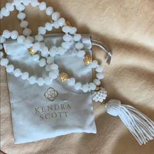 White stone long necklace with beaded tassel